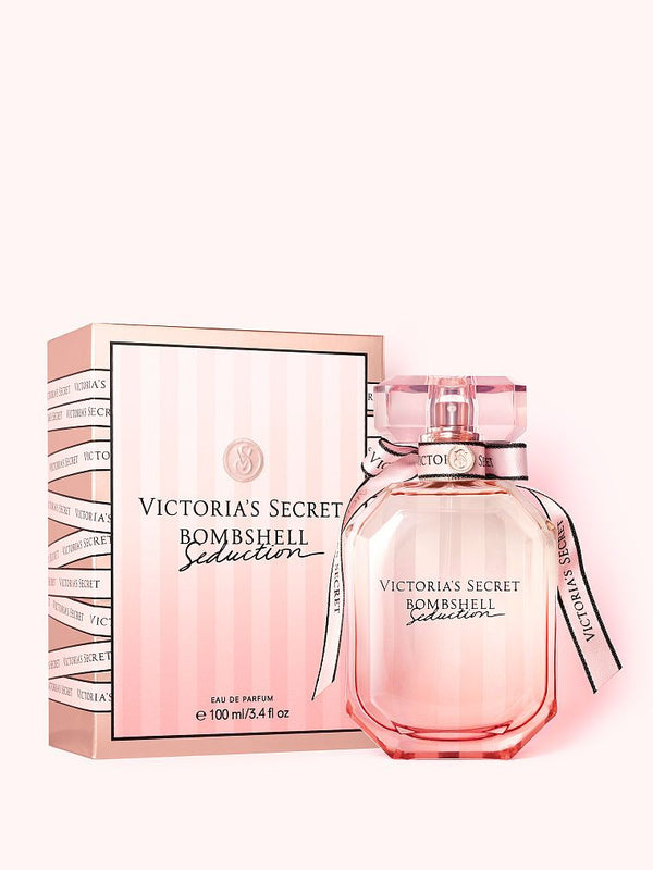 Victoria's Secret Bombshell Seduction Eau De Parfum Spray for Women 100ml 3.4 oz delicate blush pink striped glass bottle with ribbon detail and box